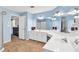 Light blue bathroom featuring tile floor, double sink vanity, and a glass door shower at 3158 Crestmont Nw Way, Kennesaw, GA 30152
