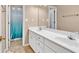 Bathroom featuring double sink vanity, mirror and door to shower and toilet at 3158 Crestmont Nw Way, Kennesaw, GA 30152