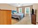 Bedroom with neutral carpet, ceiling fan, two windows and plenty of natural light at 3158 Crestmont Nw Way, Kennesaw, GA 30152