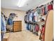 Spacious closet with shelves and rods for ample clothing storage and organization at 3158 Crestmont Nw Way, Kennesaw, GA 30152