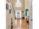 Bright foyer featuring hardwood floors and views to the front door with two story ceilings at 3158 Crestmont Nw Way, Kennesaw, GA 30152