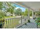 Inviting front porch with a cozy seating area, offering a relaxing outdoor space with a view at 3158 Crestmont Nw Way, Kennesaw, GA 30152