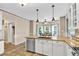 Spacious kitchen features granite counters, stainless appliances, eat-in breakfast nook, and tile flooring at 3158 Crestmont Nw Way, Kennesaw, GA 30152