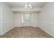 Bright dining room with tile flooring and a window with blinds at 5107 Rails Way, Norcross, GA 30071