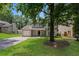 Charming two-story home with a well-maintained lawn and attached garage with driveway at 5107 Rails Way, Norcross, GA 30071