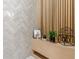 Beautiful bathroom with vertical plank and herring bone pattern at 6394 Wood Valley Rd, Douglasville, GA 30134