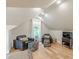Cozy bedroom featuring hardwood floors, natural light, and comfortable furnishings at 6394 Wood Valley Rd, Douglasville, GA 30134