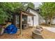 Charming backyard featuring a shed, gravel area, and cozy seating, perfect for relaxation and outdoor enjoyment at 6394 Wood Valley Rd, Douglasville, GA 30134