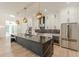 Stunning kitchen with a large island, stainless steel appliances, and modern pendant lighting at 6394 Wood Valley Rd, Douglasville, GA 30134