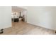 Hardwood floors flow from the living room into a modern kitchen at 6394 Wood Valley Rd, Douglasville, GA 30134