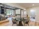 Open concept with kitchen, media space, and partial bathroom at 6394 Wood Valley Rd, Douglasville, GA 30134