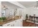 Eat-in kitchen features granite counters and stainless steel sink at 1911 Stancrest Nw Trce, Kennesaw, GA 30152