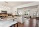 Modern kitchen with granite countertops, stainless steel appliances, and an open layout at 1911 Stancrest Nw Trce, Kennesaw, GA 30152