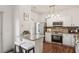 Modern kitchen featuring stainless steel appliances, granite countertops, and a breakfast bar at 1911 Stancrest Nw Trce, Kennesaw, GA 30152