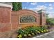 Entrance sign to CedarLake community, surrounded by flowers at 1911 Stancrest Nw Trce, Kennesaw, GA 30152