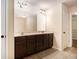 Bathroom featuring dual sink vanity with marble countertops at 2725 Morgan Glen Rd, Buford, GA 30519