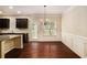 Dining area with hardwood floors, a chandelier, and natural light at 2725 Morgan Glen Rd, Buford, GA 30519
