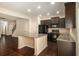 Spacious kitchen with island, modern appliances, and hardwood floors at 2725 Morgan Glen Rd, Buford, GA 30519