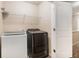 Convenient laundry room equipped with modern washer and dryer at 2725 Morgan Glen Rd, Buford, GA 30519