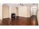 Open living room featuring a fireplace, ceiling fan, and hardwood flooring at 2725 Morgan Glen Rd, Buford, GA 30519