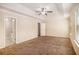 Spacious main bedroom with two windows and neutral carpeting at 2725 Morgan Glen Rd, Buford, GA 30519