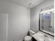 Clean bathroom with a tub and shower combo, plus modern fixtures at 2955 Terry Sw Ln, Marietta, GA 30064