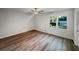 Bright bedroom with gleaming hardwood floors and natural light streaming through the window at 2955 Terry Sw Ln, Marietta, GA 30064