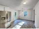 Bright dining area features stainless steel refrigerator, with lots of natural light at 2955 Terry Sw Ln, Marietta, GA 30064