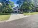 Charming two-story home with a well-maintained lawn, inviting front porch, and convenient attached garage at 2955 Terry Sw Ln, Marietta, GA 30064