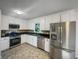 Modern kitchen features stainless steel appliances, sleek countertops, and ample cabinet space at 2955 Terry Sw Ln, Marietta, GA 30064