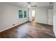 Spacious main bedroom featuring hardwood floors, a ceiling fan, and ensuite access at 2955 Terry Sw Ln, Marietta, GA 30064