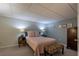 Basement bedroom featuring neutral tones, soft lighting, and minimalist decor at 3300 Wiltshire Dr, Avondale Estates, GA 30002