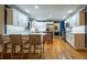 Spacious kitchen featuring white cabinets, a center island, and stainless steel appliances at 3300 Wiltshire Dr, Avondale Estates, GA 30002