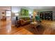 Inviting living room with hardwood floors, stylish furniture, and ample natural light at 3300 Wiltshire Dr, Avondale Estates, GA 30002
