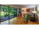 Bright living room with hardwood floors and sliding glass doors to the backyard at 3300 Wiltshire Dr, Avondale Estates, GA 30002