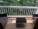 View of a balcony with outdoor seating showcasing a peaceful wooded setting at 3515 Shepherds Path, Decatur, GA 30034