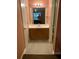 Bathroom with a white vanity and a full mirror, leading to another room at 3515 Shepherds Path, Decatur, GA 30034
