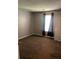 Bedroom featuring a window with dark curtains and neutral-colored carpet at 3515 Shepherds Path, Decatur, GA 30034