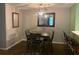 Dining room with modern chandelier, dark table and gray walls at 3515 Shepherds Path, Decatur, GA 30034