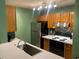 Functional kitchen with stainless steel appliances and a light-colored countertop and dark backsplash at 3515 Shepherds Path, Decatur, GA 30034
