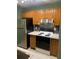 Efficient kitchen layout featuring stainless steel appliances and ample cabinet space at 3515 Shepherds Path, Decatur, GA 30034