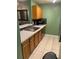 Cozy kitchen with updated countertops, appliances and wood cabinets at 3515 Shepherds Path, Decatur, GA 30034