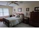 Comfortable bedroom featuring a wood bed frame and complementing wooden furniture at 529 Valley Woods Se Cir, Conyers, GA 30094