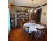 Dining room with a vintage cabinet and table setting, perfect for Gathering dinners at 529 Valley Woods Se Cir, Conyers, GA 30094
