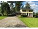 Charming two-story home with a long driveway and a covered carport at 529 Valley Woods Se Cir, Conyers, GA 30094