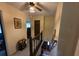 Hallway with overhead lighting and wood trim, providing access to various rooms at 529 Valley Woods Se Cir, Conyers, GA 30094