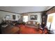 Spacious living room featuring a piano and classic furniture at 529 Valley Woods Se Cir, Conyers, GA 30094