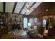 Inviting living room with brick fireplace and beam ceiling at 529 Valley Woods Se Cir, Conyers, GA 30094