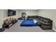 Spacious finished basement with a comfortable lounging area and carpet floors at 250 Daileys Plantation Dr, Mcdonough, GA 30253