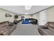 View of the finished basement, which features a lounging area and carpet floors at 250 Daileys Plantation Dr, Mcdonough, GA 30253